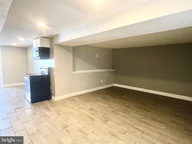 basement with light wood-type flooring