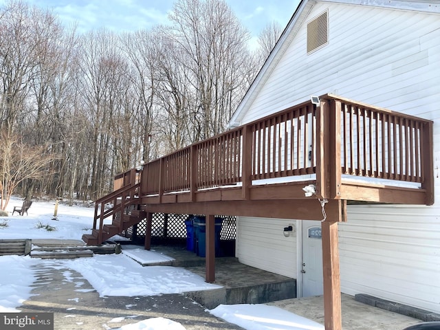 view of snow covered deck