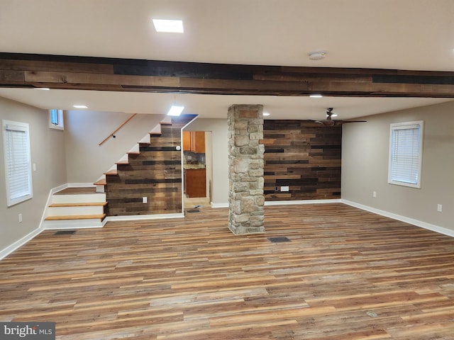 basement with wood-type flooring