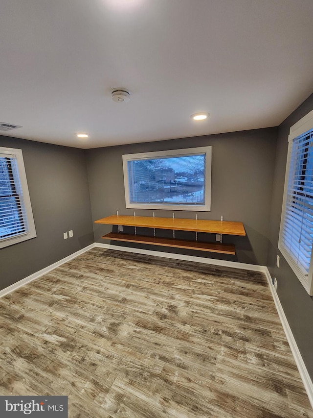 home theater with hardwood / wood-style floors