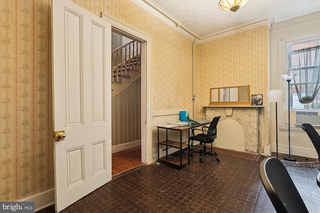 office with a textured ceiling, ornamental molding, cooling unit, and plenty of natural light