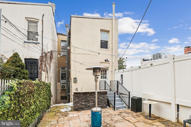 back of house featuring a patio