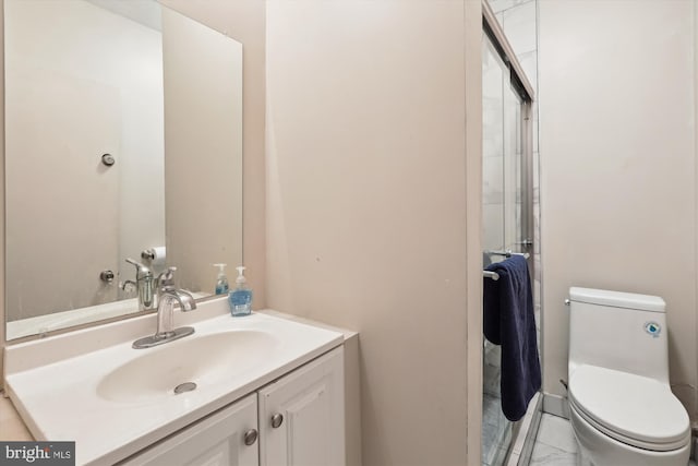 bathroom with toilet and vanity