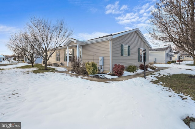 view of snow covered property