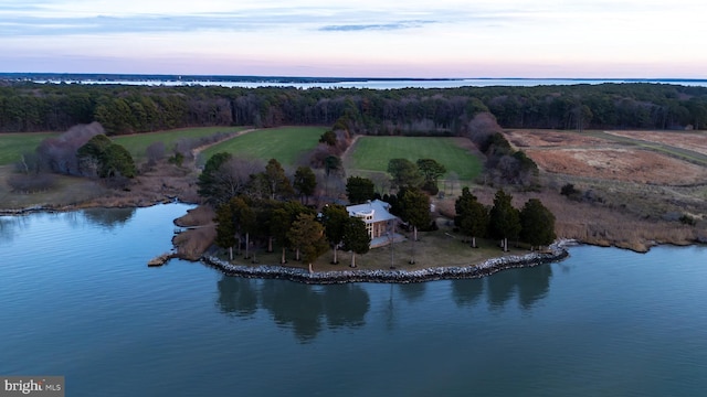 aerial view at dusk with a water view