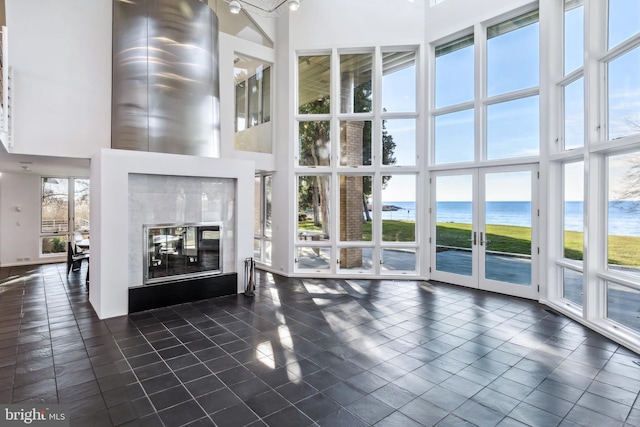 lobby featuring a beach view and a water view