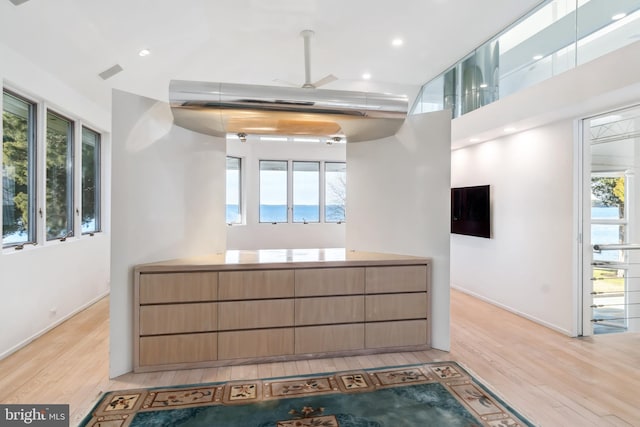 interior space featuring ceiling fan