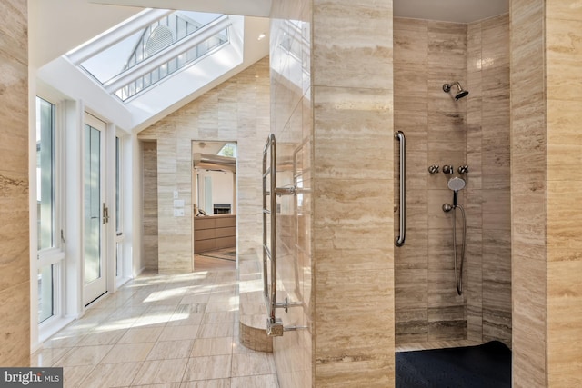 bathroom with tiled shower