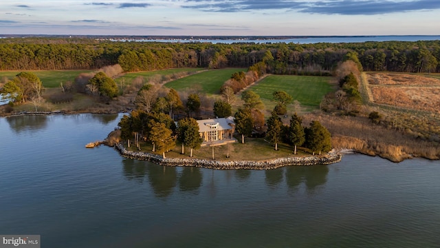 aerial view at dusk with a water view