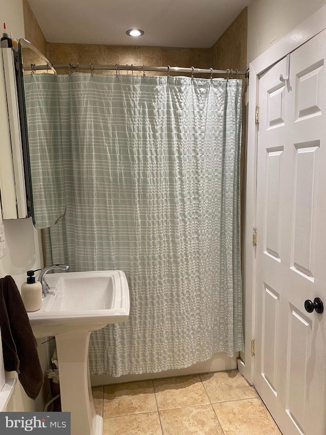 bathroom with tile patterned flooring