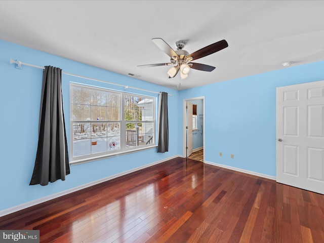 interior space with ceiling fan and hardwood / wood-style flooring