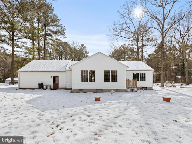 view of snow covered property