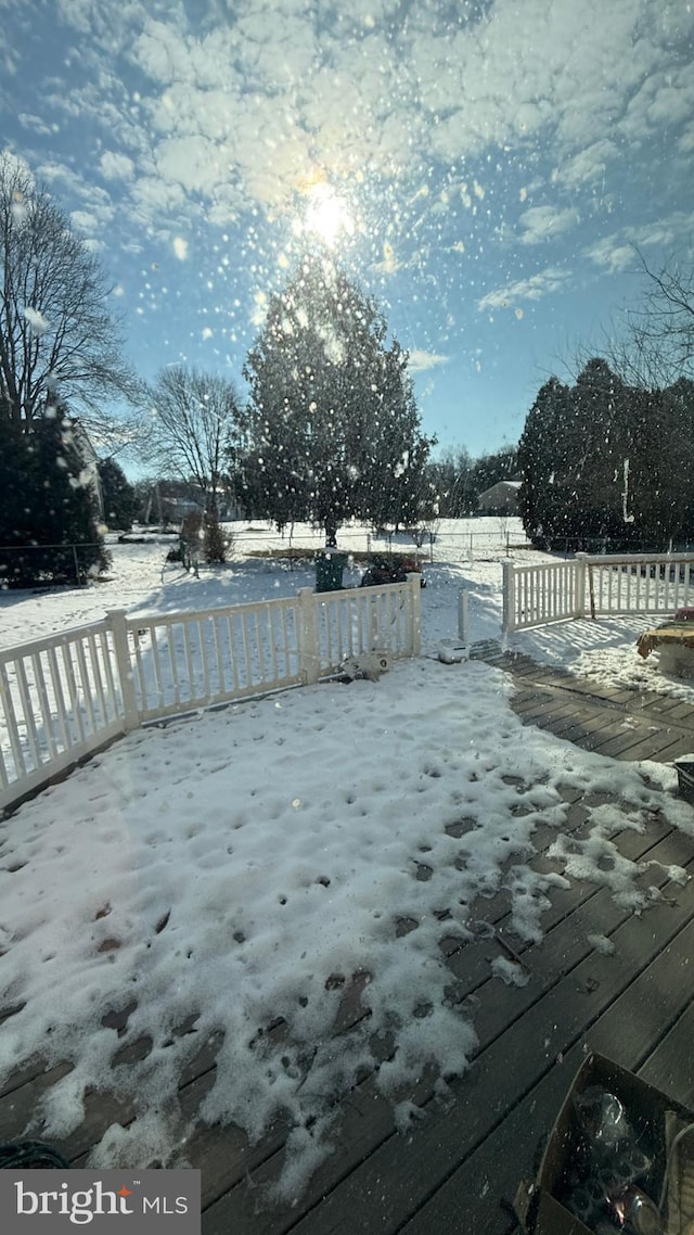 view of snow covered deck