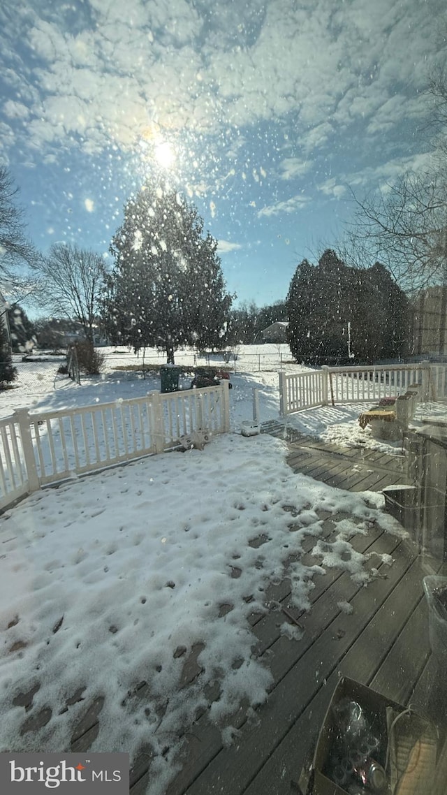 view of snow covered deck