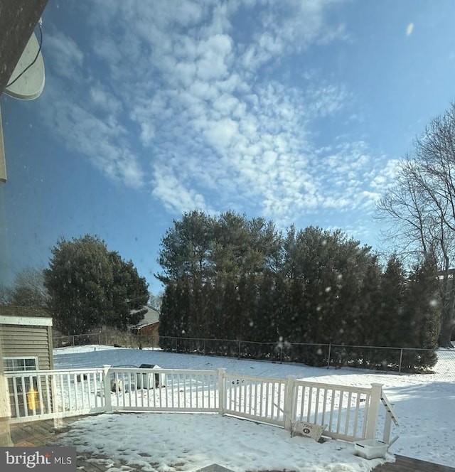 view of snow covered pool