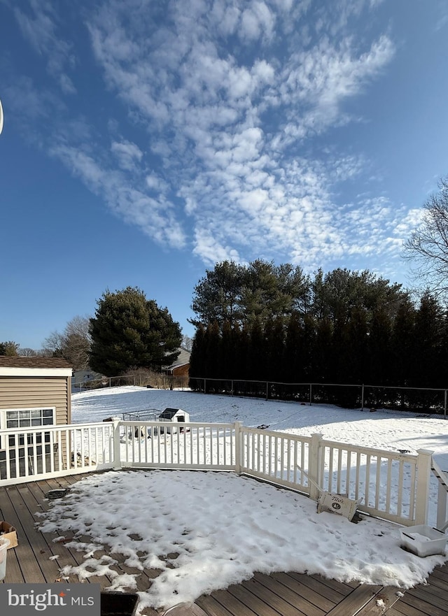 view of snow covered deck