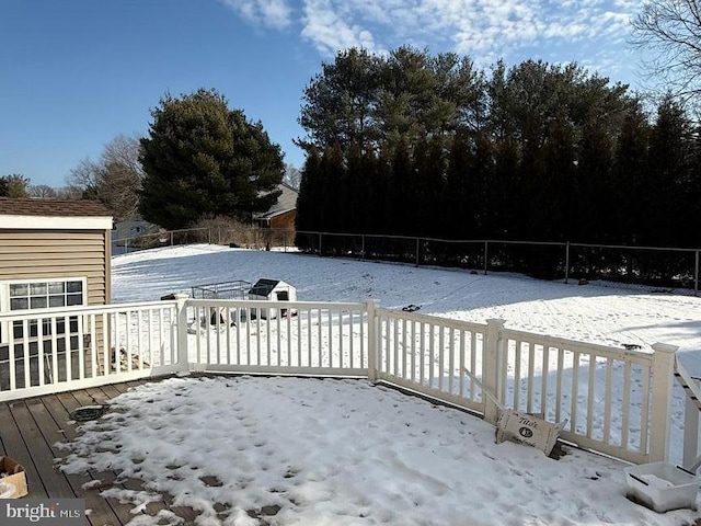 view of snow covered deck