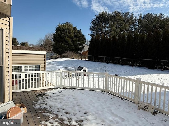 view of snow covered deck