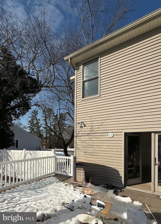 view of snow covered property