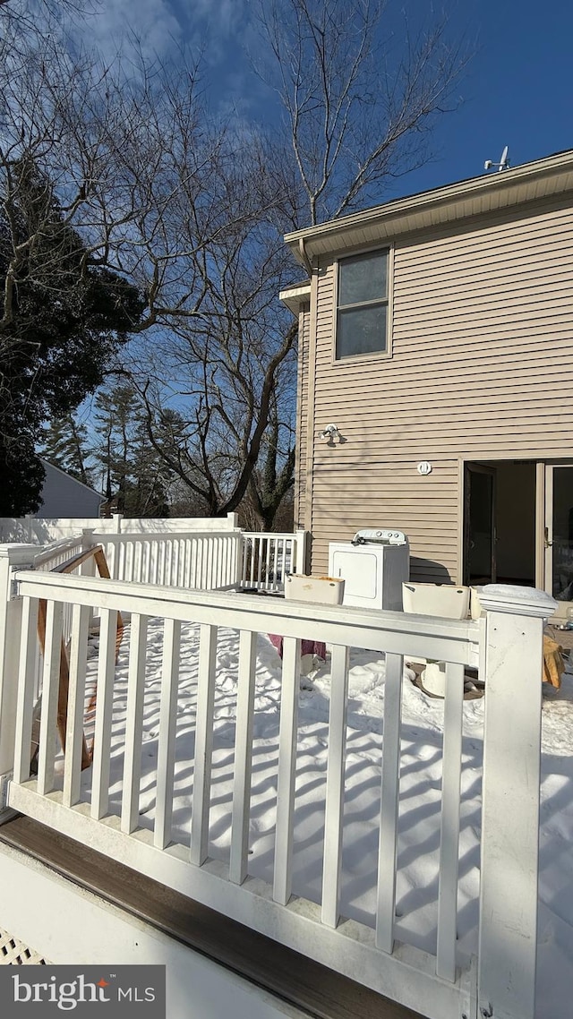 view of snow covered deck