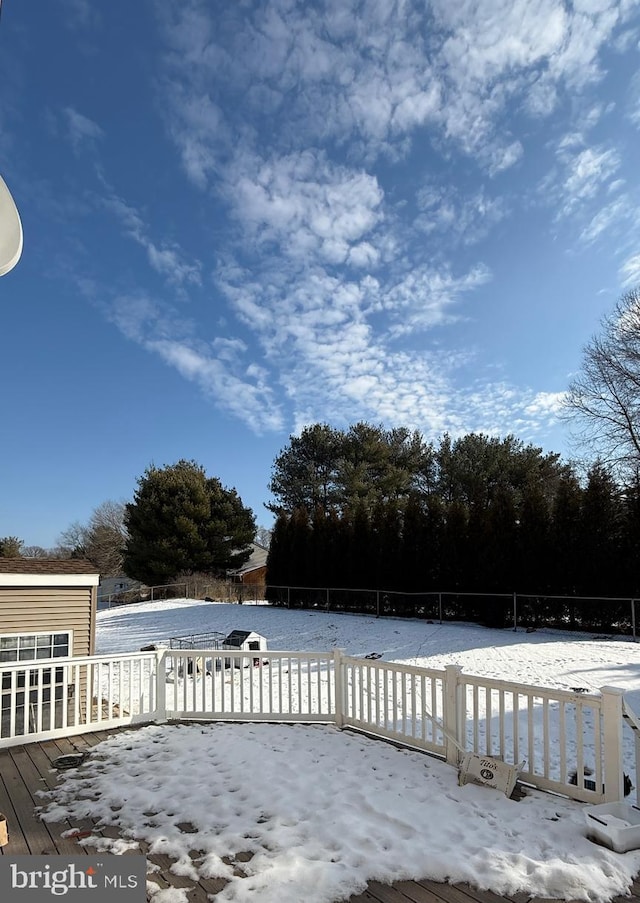 view of snow covered deck