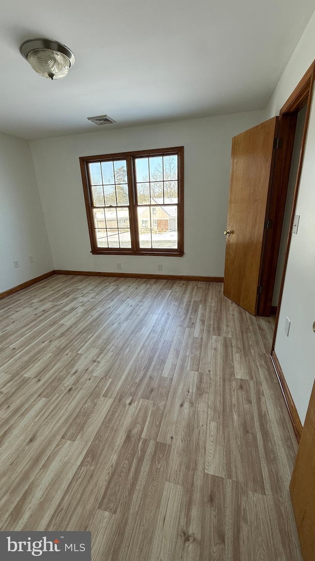 empty room featuring light wood-type flooring