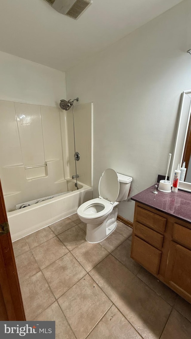 full bathroom featuring toilet, tile patterned flooring, shower / tub combination, and vanity