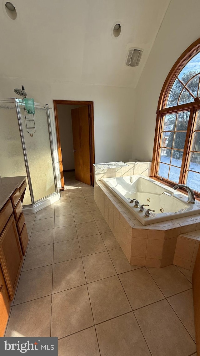 bathroom with separate shower and tub, tile patterned floors, and vanity