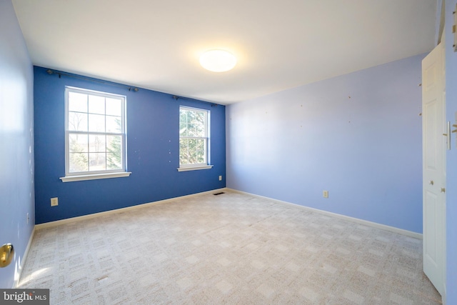 view of carpeted spare room