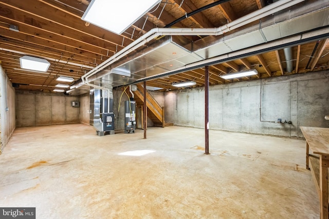 basement with heating unit and gas water heater