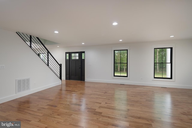 foyer with light wood-type flooring