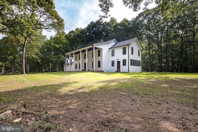 exterior space featuring a front lawn