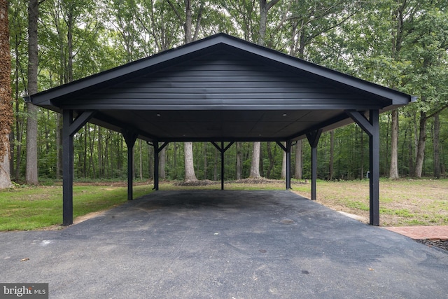 view of parking / parking lot with a carport