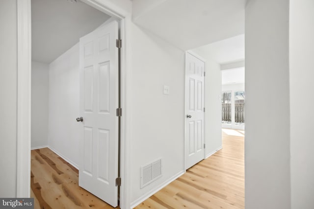 hallway featuring hardwood / wood-style floors