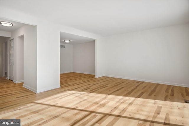 empty room featuring hardwood / wood-style floors