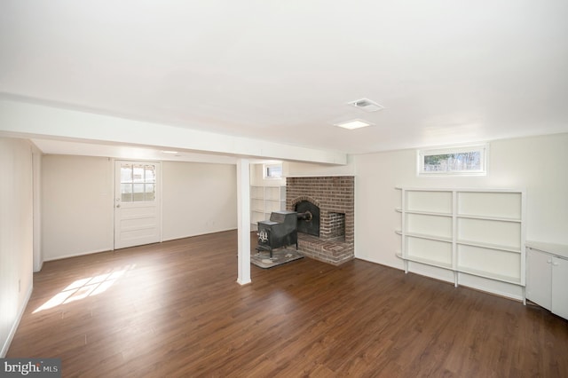 basement featuring dark hardwood / wood-style floors