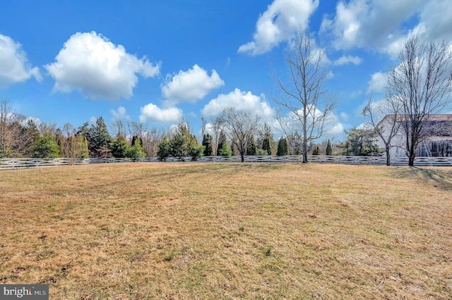 view of yard with a rural view