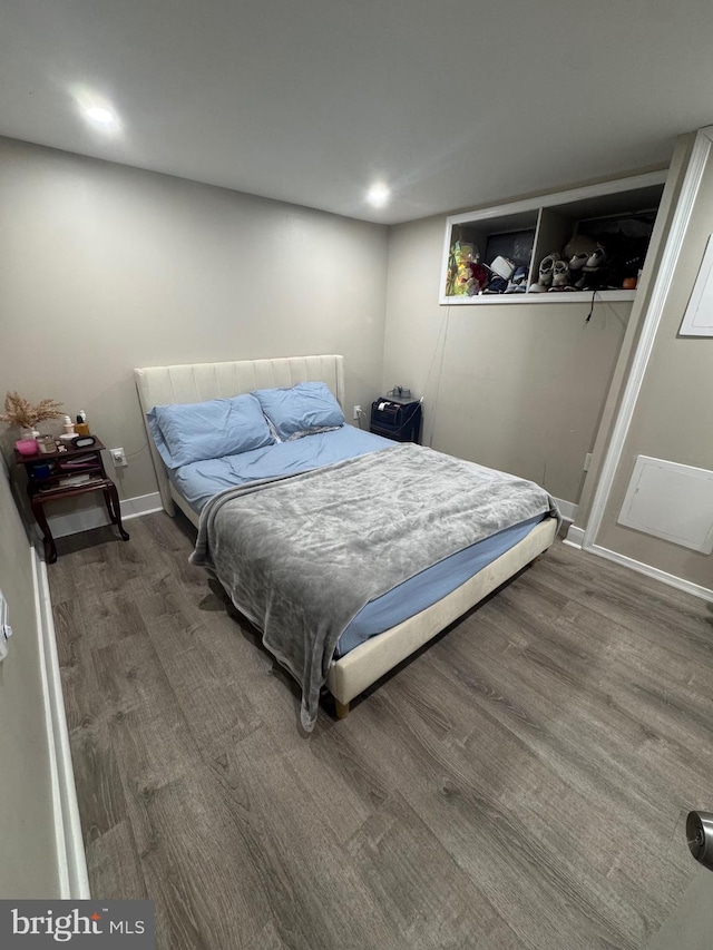 bedroom featuring dark hardwood / wood-style floors