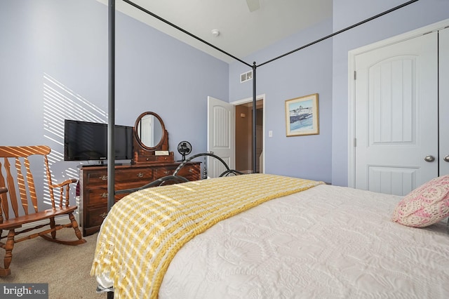 bedroom featuring carpet, a closet, and ceiling fan