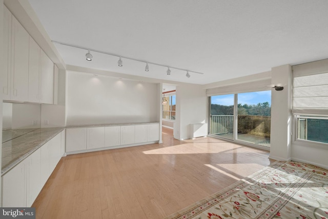 empty room featuring light hardwood / wood-style floors