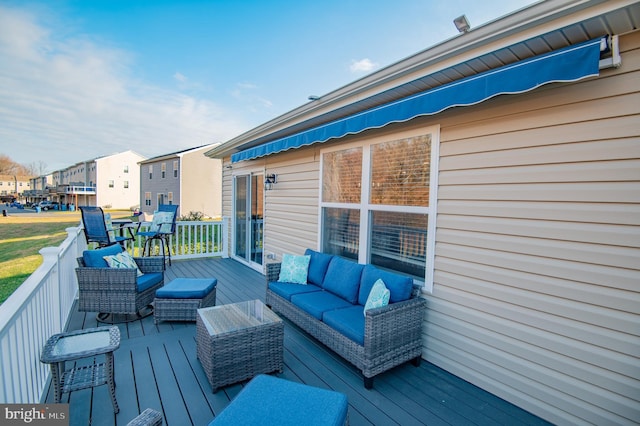 wooden deck with outdoor lounge area