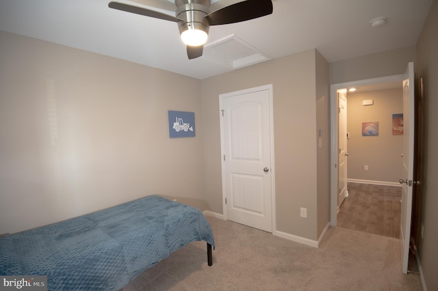 bedroom with light carpet and ceiling fan