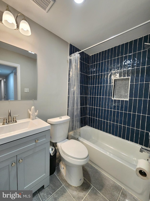 bathroom featuring tile patterned flooring, visible vents, toilet, shower / tub combo with curtain, and vanity