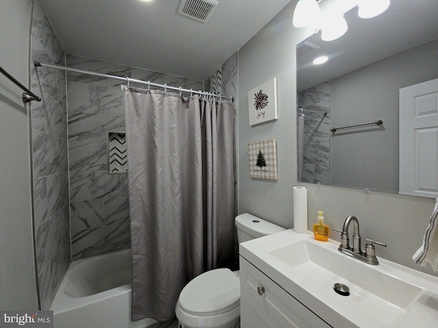 full bathroom featuring vanity, toilet, visible vents, and shower / tub combo with curtain