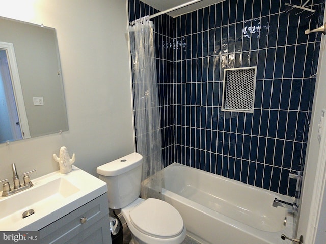 full bath featuring toilet, vanity, and shower / bath combination with curtain