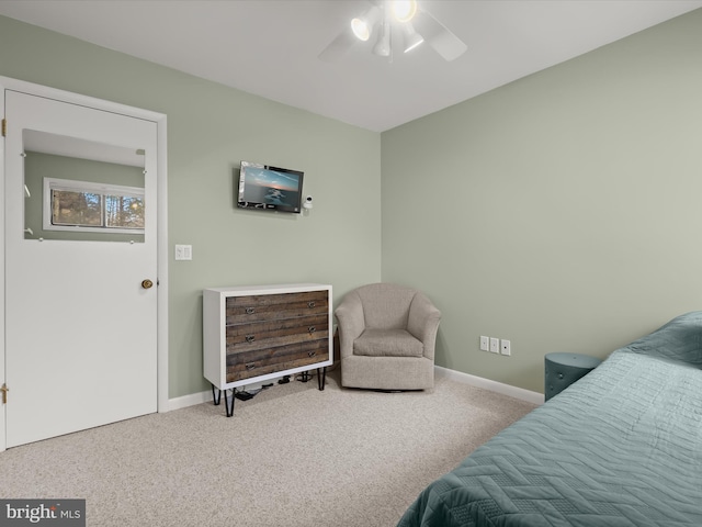 bedroom with ceiling fan and carpet floors