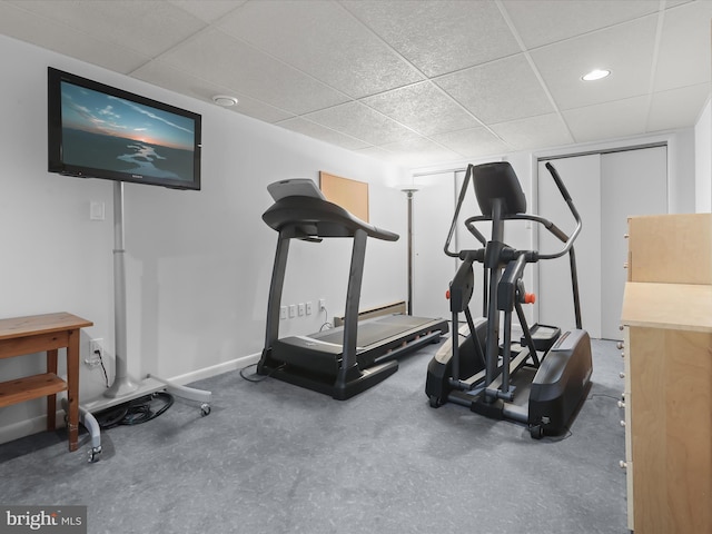 exercise room with a drop ceiling