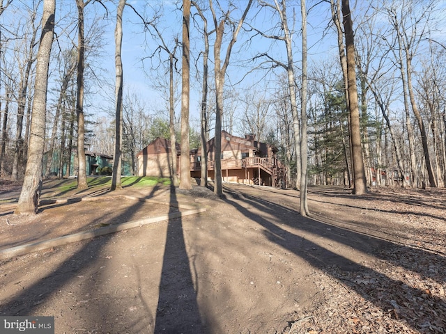 view of front facade featuring a wooden deck