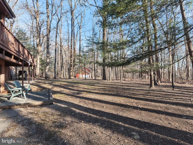 view of yard featuring a deck