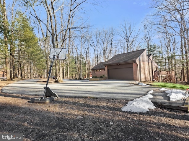 exterior space with a garage